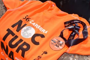 Camiseta y medalla Nocturna del Guadalquivir KH7