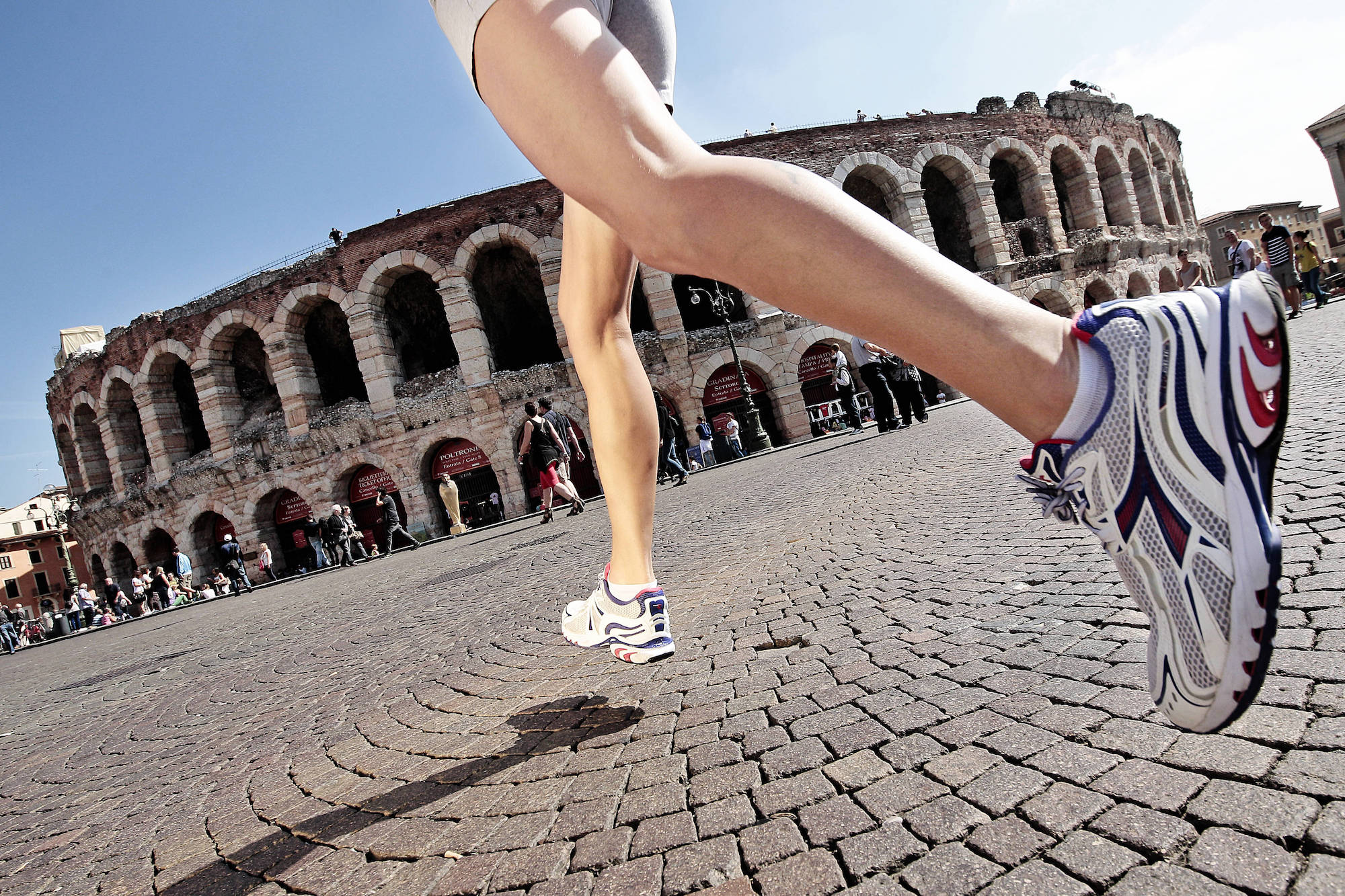 Greta Cicolari runs in front of the Arena in Verona, Italy, on September 16th, 2013 // Federico Modica / Red Bull Content Pool // SI201309180224 // Usage for editorial use only //